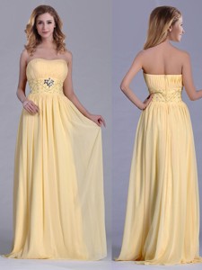 Lovely Empire Yellow Long Dama Dress With Beading And Ruching